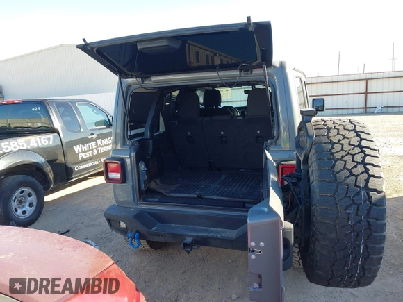2018 Jeep Wrangler Unlimited Sahara with VIN 1C4HJXEG8JW239535, listed as a IAAI auction lot 41711596 with 85,675 mi miles. Bid and sale history available at carsss.com. Image 18.