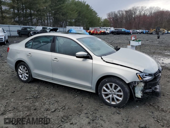 2011 Volkswagen Jetta Sedan SE w/Convenience & Sunroof PZEV with VIN 3VWDZ7AJ4BM321706, listed as a Copart auction lot 50499265 with 73,098 mi miles and Salvage Title. Bid and sale history available at carsss.com. Image 4.