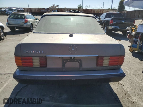 1989 Mercedes-Benz 560 with VIN WDBCA39D7KA428953, listed as a Copart auction lot 80856634 with 243,871 mi miles and Clean Title. Bid and sale history available at DreamBid. Image 6.
