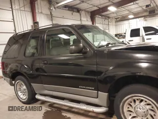 2001 Ford Explorer Sport z VIN 1FMYU60E71UA76200, wystawiony jako IAAI lot #41358321 z przebiegiem 118 134 mil mil oraz . Historia ofert i sprzedaży dostępna na DreamBid. Obrazek 14.