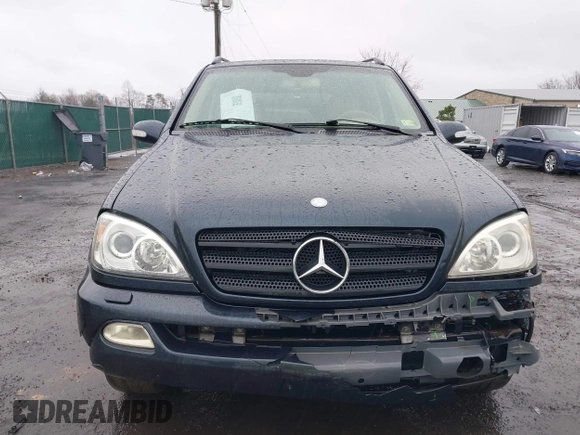 2003 Mercedes-Benz M-Class 3.2L with VIN 4JGAB54EX3A390987, listed as a IAAI auction lot 41482335 with 191,381 mi miles. Bid and sale history available at carsss.com. Image 12.