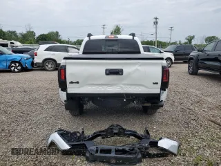 2023 Toyota Tacoma SR with VIN 3TMCZ5AN2PM642205, listed as a Copart auction lot 61045955 with 10,596 mi miles and Salvage title. Bid and sale history available at DreamBid. Image 6.
