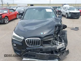 2017 BMW X1 xDrive28i with VIN WBXHT3Z34H4A53528, listed as a IAAI auction lot 42429800 with 75,986 mi miles and . Bid and sale history available at DreamBid. Image 12.