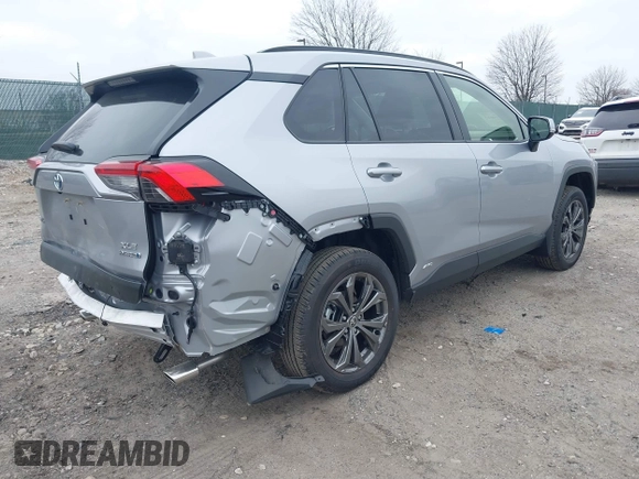 2024 Toyota RAV4 Hybrid XLE Premium with VIN JTMB6RFV0RD140022, listed as a IAAI auction lot 41779613 with 923 mi miles. Bid and sale history available at carsss.com. Image 4.