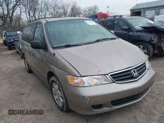 2004 Honda Odyssey EX-L with VIN 5FNRL18084B119768, listed as a IAAI auction lot 41693581 with 211,255 mi miles and . Bid and sale history available at DreamBid. Image 1.