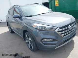2018 Hyundai Tucson Value with VIN KM8J3CA24JU646807, listed as a IAAI auction lot 41960629 with 117,646 mi miles. Bid and sale history available at carsss.com. Image 1.