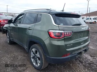 2020 Jeep Compass Limited with VIN 3C4NJDCBXLT123657, listed as a IAAI auction lot 42004527 with 99,669 mi miles and . Bid and sale history available at DreamBid. Image 3.