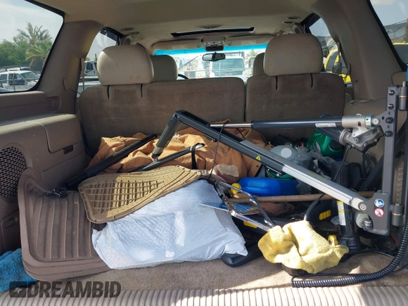 2002 Chevrolet Tahoe LS with VIN 1GNEC13ZX2J265803, listed as a IAAI auction lot 42571325 with 265,954 mi miles and . Bid and sale history available at DreamBid. Image 12.