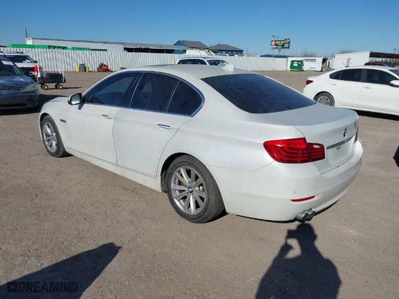 2014 BMW 5 Series 528i with VIN WBA5A5C57ED504582, listed as a IAAI auction lot 41699668 with 113,792 mi miles. Bid and sale history available at carsss.com. Image 3.