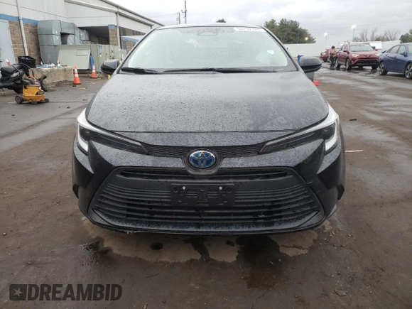 2023 Toyota Corolla Hybrid LE with VIN JTDBDMHE2P3002183, listed as a Copart auction lot 50292785 with 7,065 mi miles and Salvage Title. Bid and sale history available at carsss.com. Image 5.