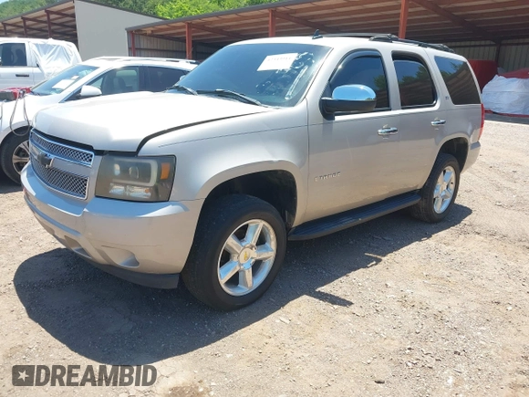 2007 Chevrolet Tahoe LTZ with VIN 1GNFK13037R265384, listed as a IAAI auction lot 42343911 with 162,688 mi miles and . Bid and sale history available at DreamBid. Image 2.