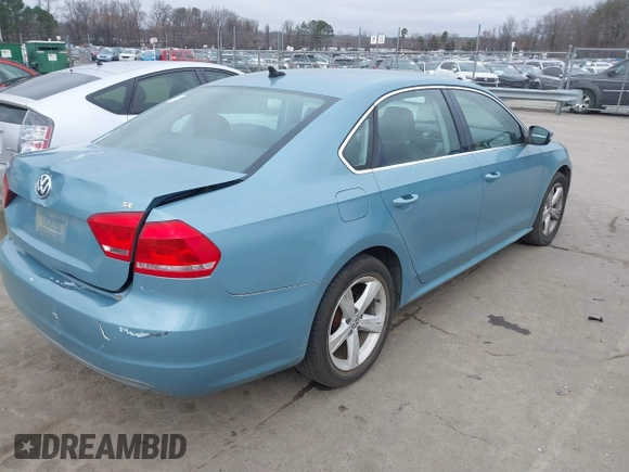 2013 Volkswagen Passat SE w/Sunroof with VIN 1VWBH7A3XDC083442, listed as a IAAI auction lot 41529678 with 138,825 mi miles. Bid and sale history available at carsss.com. Image 4.