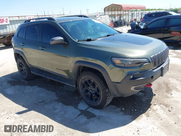 2019 Jeep Cherokee Trailhawk Elite with VIN 1C4PJMBN7KD287506, listed as a IAAI auction lot 42072589 with 108,034 mi miles and . Bid and sale history available at DreamBid. Image 1.