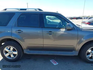 2011 Ford Escape Limited with VIN 1FMCU0EG2BKA67855, listed as a IAAI auction lot 41808002 with 183,476 mi miles. Bid and sale history available at carsss.com. Image 13.