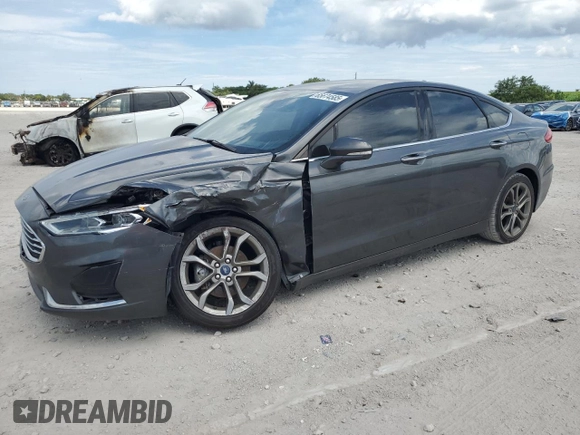 2020 Ford Fusion SEL with VIN 3FA6P0CD5LR177156, listed as a Copart auction lot 65674585 with 123,728 mi miles and Salvage title. Bid and sale history available at DreamBid. Image 1.