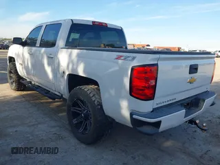 2017 Chevrolet Silverado 1500 LT with VIN 3GCUKREC4HG466329, listed as a IAAI auction lot 41305052 with 57,844 mi miles and . Bid and sale history available at DreamBid. Image 3.