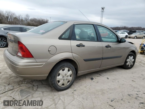 2003 Ford Focus LX with VIN 1FAFP33P73W114861, listed as a Copart auction lot 44859405 with 100,574 mi miles and Salvage Title. Bid and sale history available at carsss.com. Image 3.