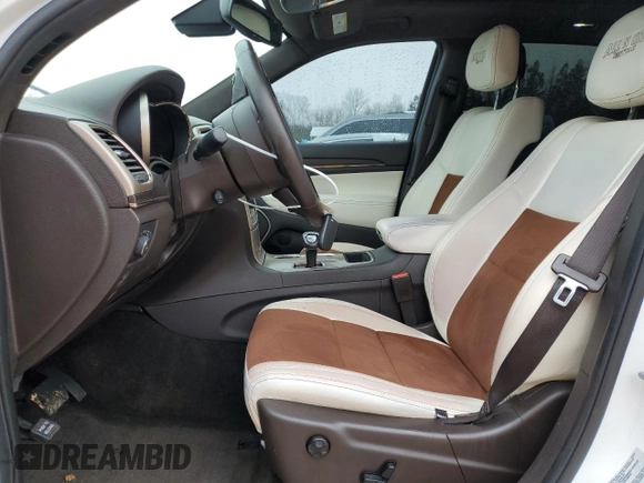 2015 Jeep Grand Cherokee Summit with VIN 1C4RJEJG8FC118673, listed as a Copart auction lot 84052044 with 182,806 mi miles and Salvage title. Bid and sale history available at DreamBid. Image 7.