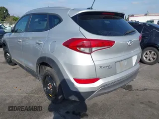 2016 Hyundai Tucson Sport with VIN KM8J33A20GU165154, listed as a IAAI auction lot 41611785 with Not Provided miles. Bid and sale history available at carsss.com. Image 3.
