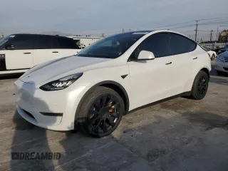 2021 Tesla Model Y Long Range z VIN 5YJYGDEE7MF090698, wystawiony jako Copart lot #44192555 z przebiegiem 78 907 mil mil oraz Szkoda całkowita • Salvage title. Historia ofert i sprzedaży dostępna na DreamBid. Obrazek 1.