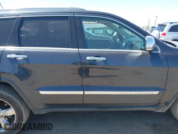 2013 Jeep Grand Cherokee Overland with VIN 1C4RJECT8DC534021, listed as a IAAI auction lot 42058374 with 137,289 mi miles. Bid and sale history available at carsss.com. Image 13.