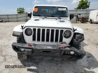 2021 Jeep Gladiator Rubicon z VIN 1C6JJTBG0ML624275, wystawiony jako Copart lot #62840275 z przebiegiem Nie podano mil oraz Szkoda całkowita • Salvage title. Historia ofert i sprzedaży dostępna na DreamBid. Obrazek 5.