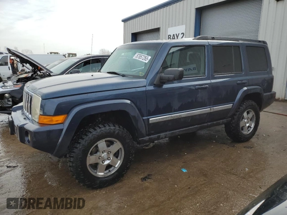 2010 Jeep Commander Sport with VIN 1J4RG4GK5AC119433, listed as a Copart auction lot 87657265 with 212,973 mi miles and Salvage title. Bid and sale history available at DreamBid. Image 1.