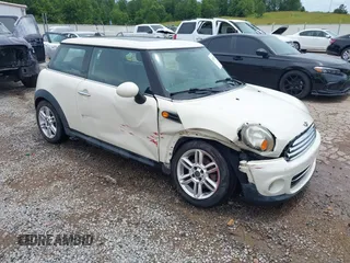 2011 MINI Hardtop with VIN WMWSU3C5XBTX95546, listed as a IAAI auction lot 42475756 with 125,873 mi miles and . Bid and sale history available at DreamBid. Image 1.
