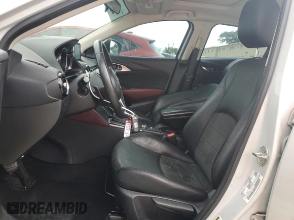 2017 Mazda CX-3 Grand Touring with VIN JM1DKFD76H0170333, listed as a Copart auction lot 43772595 with 59,693 mi miles and Salvage Title. Bid and sale history available at carsss.com. Image 7.