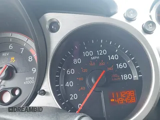 2012 Nissan 370Z Touring with VIN JN1AZ4EH4CM561415, listed as a IAAI auction lot 41838948 with 111,298 mi miles. Bid and sale history available at carsss.com. Image 7.