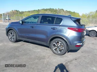 2020 Kia Sportage LX with VIN KNDPM3AC6L7720640, listed as a IAAI auction lot 41843861 with 114,977 mi miles. Bid and sale history available at carsss.com. Image 3.