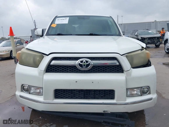 2011 Toyota 4Runner SR5 with VIN JTEZU5JR7B5014100, listed as a IAAI auction lot 41769637 with 215,474 mi miles. Bid and sale history available at carsss.com. Image 12.