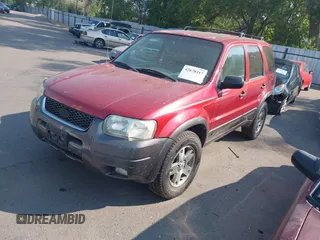 2004 Ford Escape XLT with VIN 1FMYU93114KB38538, listed as a IAAI auction lot 42678317 with 180,106 mi miles and . Bid and sale history available at DreamBid. Image 2.