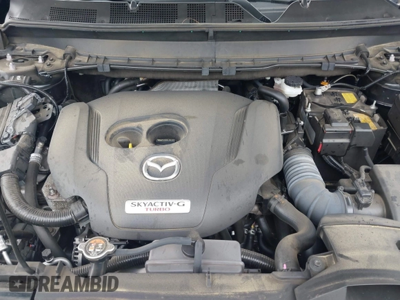2022 Mazda CX-9 Touring Plus z VIN JM3TCBAY2N0619279, wystawiony jako IAAI lot #42373722 z przebiegiem 43 540 mil mil oraz . Historia ofert i sprzedaży dostępna na DreamBid. Obrazek 10.