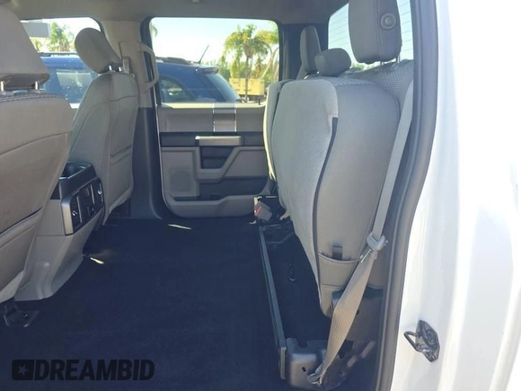 2019 Ford F-150 XL with VIN 1FTFW1E59KKE61191, listed as a IAAI auction lot 42036225 with 99,859 mi miles. Bid and sale history available at carsss.com. Image 1.
