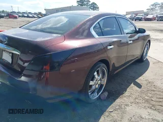 2014 Nissan Maxima S with VIN 1N4AA5AP1EC435440, listed as a IAAI auction lot 42090636 with 199,110 mi miles and . Bid and sale history available at DreamBid. Image 4.