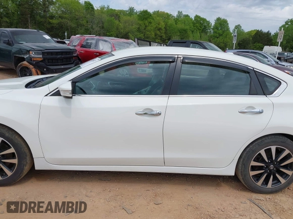 2018 Nissan Altima S with VIN 1N4AL3AP9JC128686, listed as a IAAI auction lot 42038517 with 159,024 mi miles and . Bid and sale history available at DreamBid. Image 14.