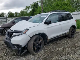 2021 Honda Passport Elite z VIN 5FNYF8H03MB008654, wystawiony jako Copart lot #57223185 z przebiegiem 42 650 mil mil oraz Szkoda całkowita • Salvage title. Historia ofert i sprzedaży dostępna na DreamBid. Obrazek 1.