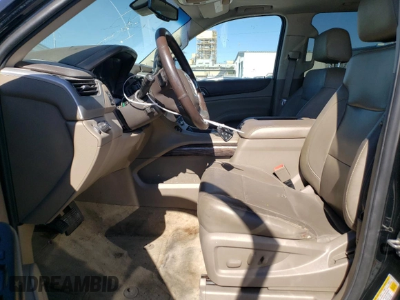 2015 GMC Yukon SLT with VIN 1GKS1BKC7FR113798, listed as a Copart auction lot 76425214 with 168,608 mi miles and Clean Title. Bid and sale history available at carsss.com. Image 7.