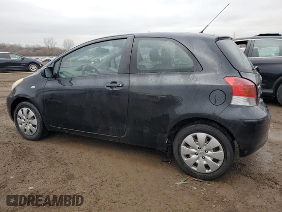 2011 Toyota Yaris with VIN JTDJT4K37B5339113, listed as a Copart auction lot 82474554 with 148,800 mi miles and Salvage Title. Bid and sale history available at carsss.com. Image 2.