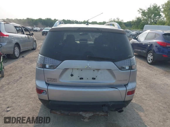 2009 Mitsubishi Outlander SE with VIN JA4LT31W09Z014816, listed as a IAAI auction lot 42399219 with 188,136 mi miles and . Bid and sale history available at DreamBid. Image 16.