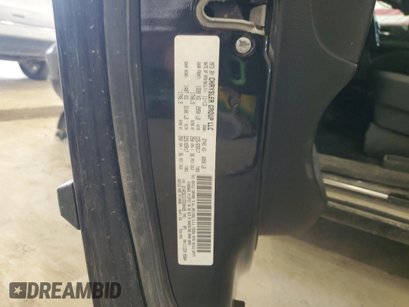 2014 Dodge Grand Caravan SXT 30th Anniversary with VIN 2C4RDGCG1ER200489, listed as a Copart auction lot 52558915 with 127,035 mi miles and Salvage Title. Bid and sale history available at DreamBid. Image 13.