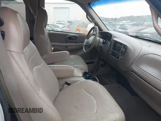 2001 Ford F-150 XL with VIN 1FTRX17L51NA07099, listed as a IAAI auction lot 41618275 with 161,169 mi miles and . Bid and sale history available at DreamBid. Image 5.