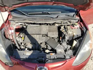 2014 Mazda 2 Touring z VIN JM1DE1LYXE0174854, wystawiony jako Copart lot #56712225 z przebiegiem 163 065 mil mil oraz Szkoda całkowita • Salvage title. Historia ofert i sprzedaży dostępna na DreamBid. Obrazek 11.