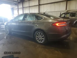 2018 Ford Fusion SE with VIN 3FA6P0PUXJR123360, listed as a Copart auction lot 65339715 with 113,635 mi miles and Salvage title. Bid and sale history available at DreamBid. Image 2.