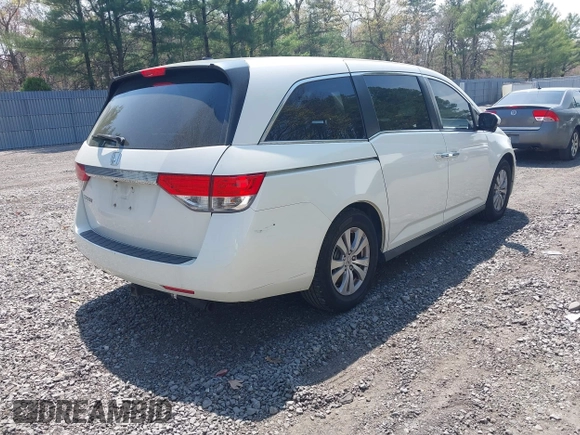 2015 Honda Odyssey EX-L with VIN 5FNRL5H64FB069742, listed as a IAAI auction lot 42101807 with 152,611 mi miles and . Bid and sale history available at DreamBid. Image 4.