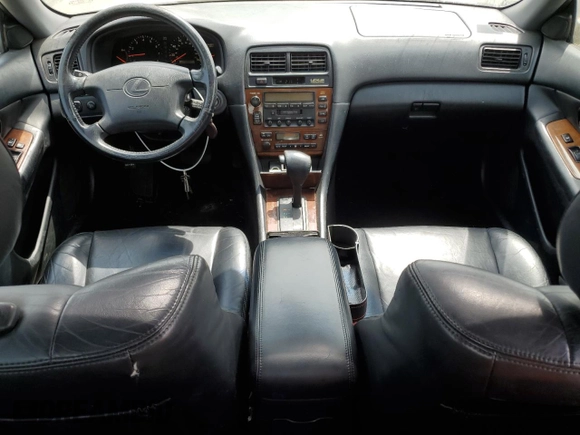 2000 Lexus ES 300 with VIN JT8BF28G7Y0288730, listed as a Copart auction lot 59120015 with 108,449 mi miles and Clean title. Bid and sale history available at DreamBid. Image 8.