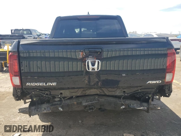 2020 Honda Ridgeline RTL with VIN 5FPYK3F58LB023282, listed as a Copart auction lot 53871545 with 69,653 mi miles and Salvage title. Bid and sale history available at DreamBid. Image 6.