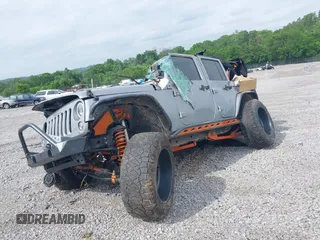 2015 Jeep Wrangler Unlimited Freedom with VIN 1C4BJWDG3FL682296, listed as a IAAI auction lot 42275536 with Not provided miles and . Bid and sale history available at DreamBid. Image 2.