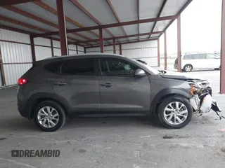 2021 Hyundai Tucson Value z VIN KM8J33A47MU309988, wystawiony jako IAAI lot #41749644 z przebiegiem 61 197 mil mil oraz . Historia ofert i sprzedaży dostępna na DreamBid. Obrazek 13.